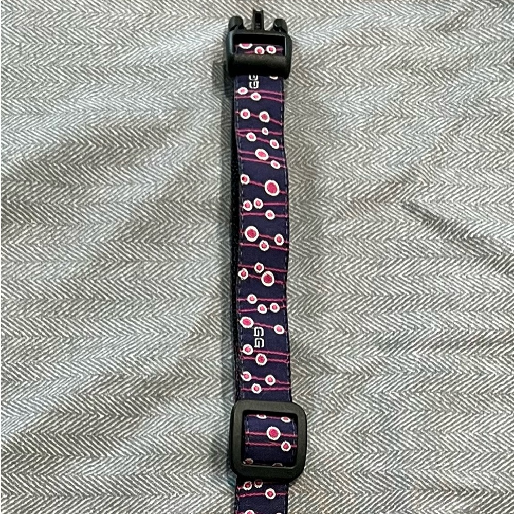 Nylon dog collar with decorative ribbon. Excellent condition.